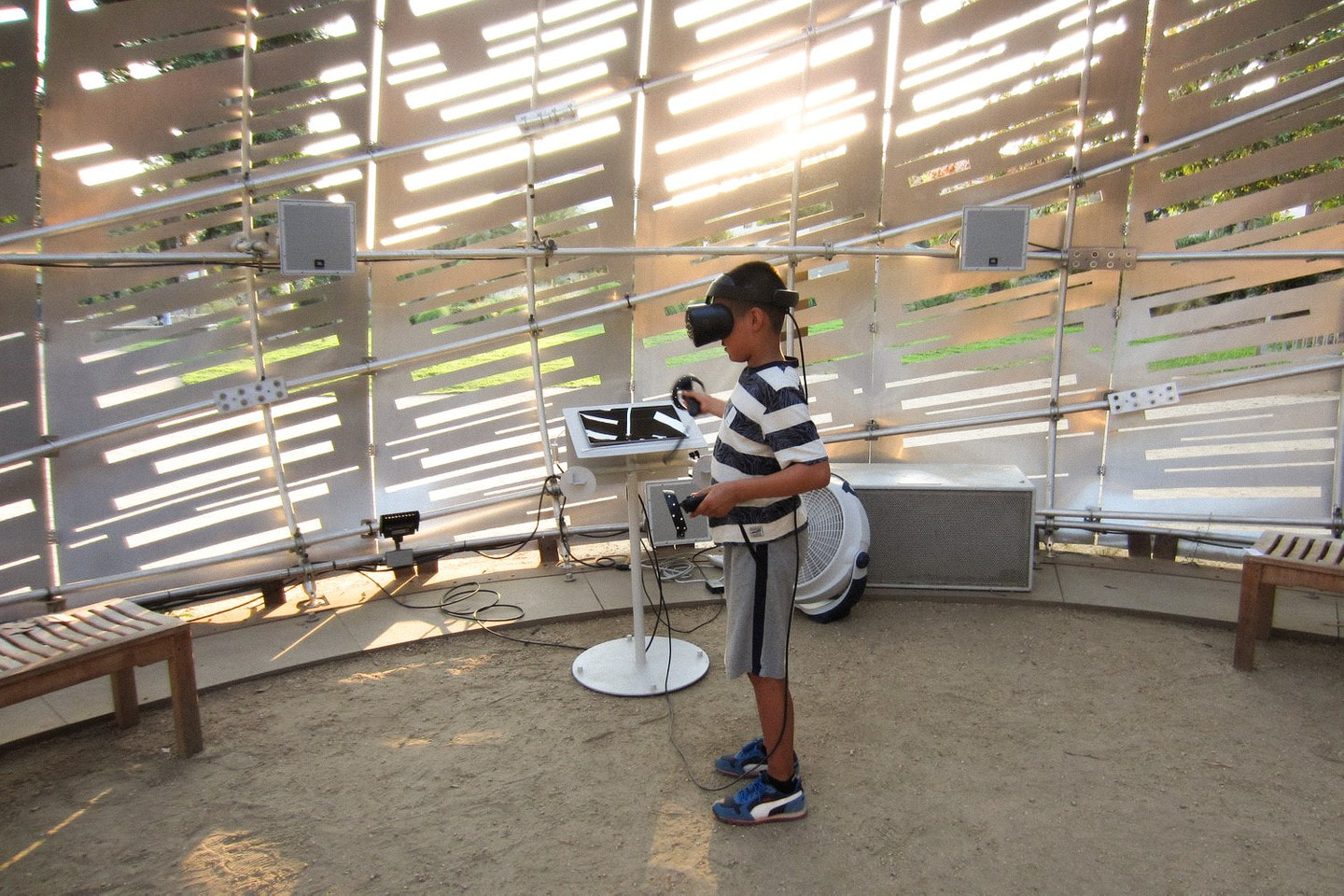 A visitor experincing In Orbit within the Orbit Pavilion